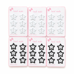 0d282cae-64d8-4825-8fbb-69d67ed2d6e5 12 Sets de gancho para cabello en forma de estrella - blanco o negro